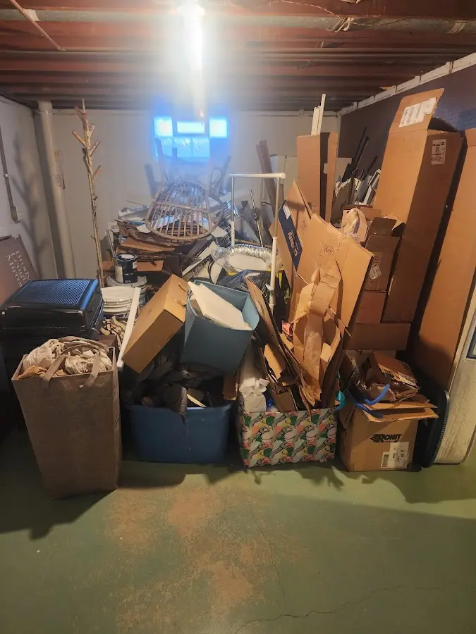 Roll-off dumpster container at job site for Concrete Dumpster Rental in Durham